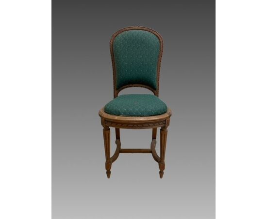 Six chairs with upholstered seats and backs, Louis XVI