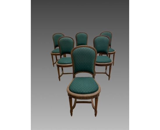 Six chairs with upholstered seats and backs, Louis XVI