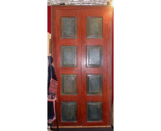 Door with walnut frame painted in tempera.