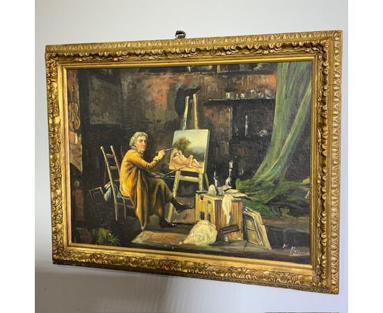 Antico dipinto olio su tavola Atelier d artista. Epoca 1850 con cornice antica dorata. Mis 64 x 50 . Firmato 