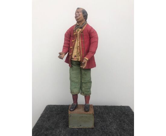 Crib figurine, with a terracotta head, depicting a peasant. Naples     