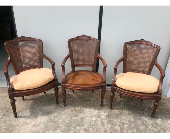 Three walnut armchairs.Luigi XVI.Italia     