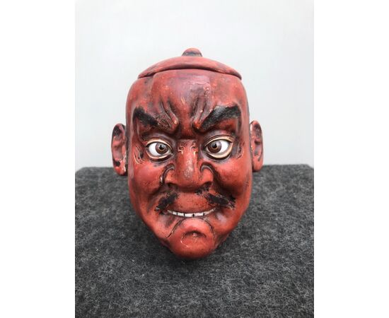 Papier-mache snuffbox depicting a Japanese head.     
