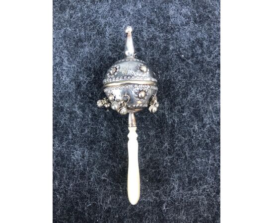 Child&#39;s rattle in silver and ivory.Europe     