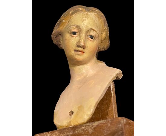 Serie dì 6 teste dì statuine da presepe napoletane in terracotta dipinta con occhi in vetro montate su base lignea.