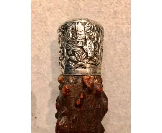 Stick with silver knob engraved with characters. China.     