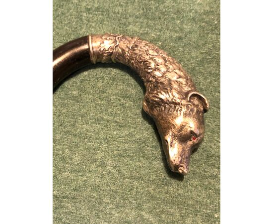 Stick with solid silver pommel depicting a dog&#39;s head. Ruby eyes. Rosewood barrel. Italian punch.     