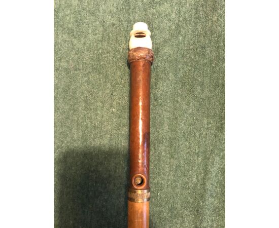 &#39;Flute&#39; stick, in bone and leather. Barrel in rattan.     