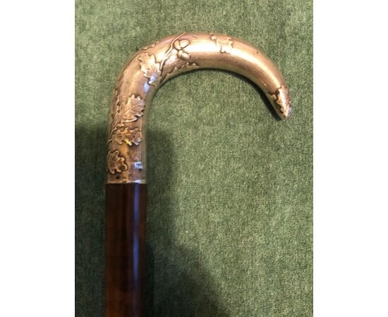 Stick with silver handle with acorn and oak leaves decoration.     