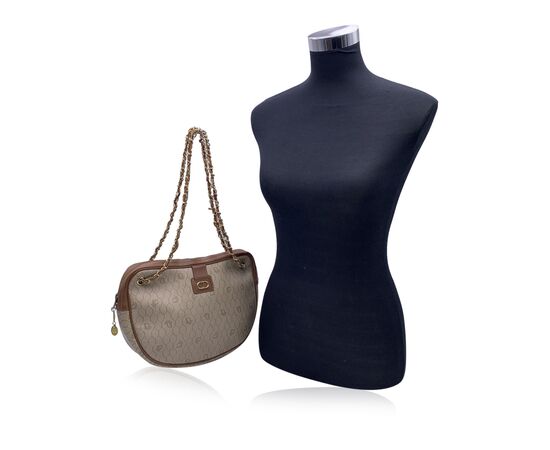 DIOR Borsa a Tracolla Vintage in Tela Col. Beige <p style="text-align: left">Vintage Christian Dior beige logo canvas shoulder bag with brown leather trim. Gold metal CD logo on the front. Upper zipper closure. Gold metal interwoven leather shoulder strap