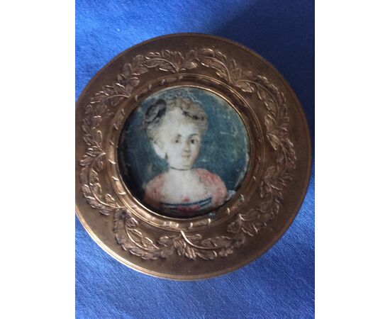 Eighteenth century engraved gold-like box with miniature on ivory     