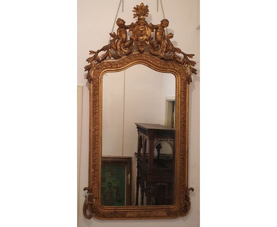 Mirror in gilded wood     