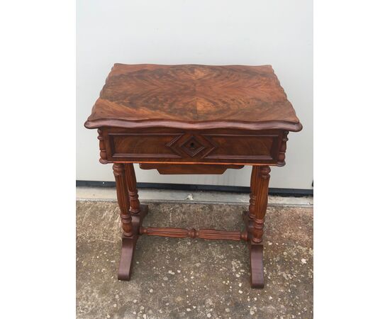 Mahogany work table with feather veneered top. Luigi Filippo period.     