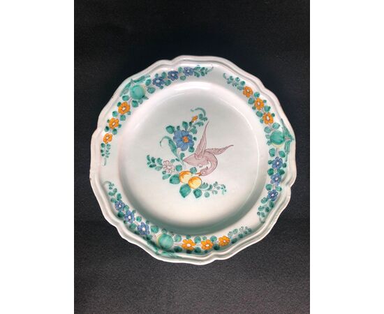 Majolica plate with floral decoration and &#39;twisted neck&#39; bird.Cerreto Sannita.     
