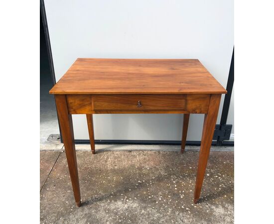 Blond walnut coffee table with one drawer, Directory period.     