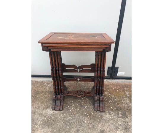 Coffee table made up of 4 mahogany side tables, one inside the other with inlaid tops. China     