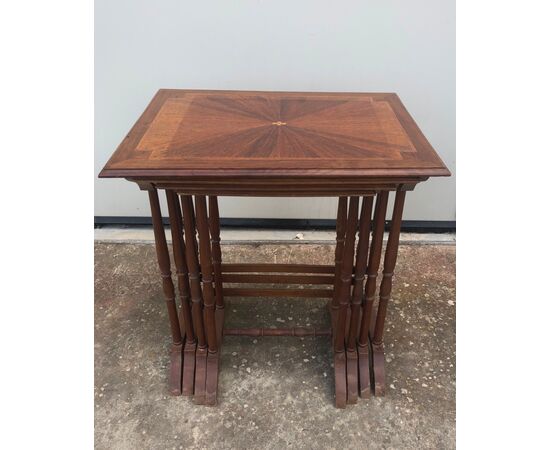 Mahogany coffee table consisting of 4 coffee tables inserted one inside the other with inlaid tops. France.     