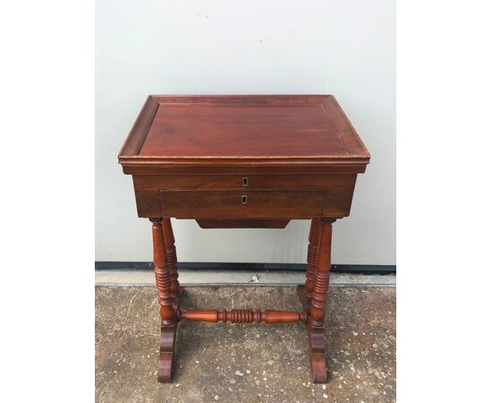 Mahogany work table.     