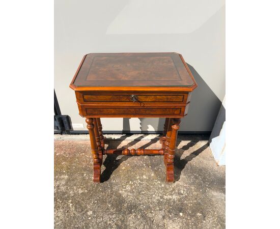 Work table in walnut veneered in briar with threads.     