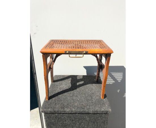 Travel folding stool-footrest in wood.     