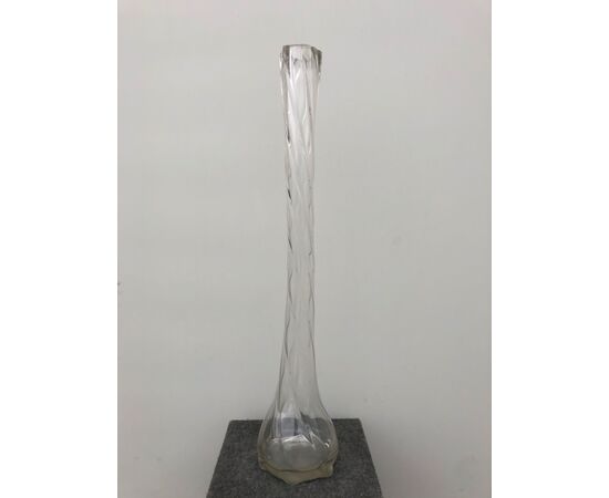 Blown transparent glass vase with twisted motif. Murano.     