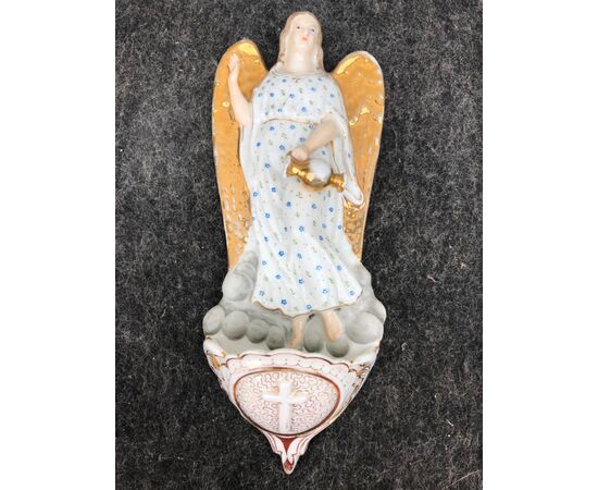 Holy water stoup in porcelain with angel figure with pourer. France.     