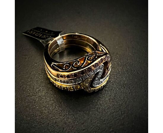 Anello  a  fascia  con  Diamanti  FANCY rosa, gialli e bianchi  1.5 ct.