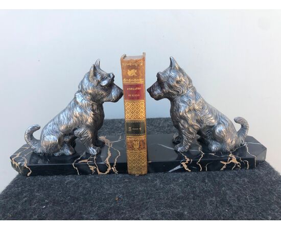 Pair of marble and antimony bookends depicting two dogs.     