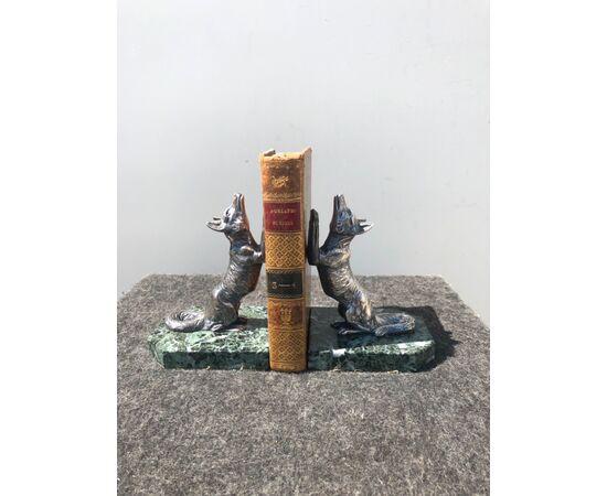 Pair of marble and antimony bookends depicting a pair of foxes.     