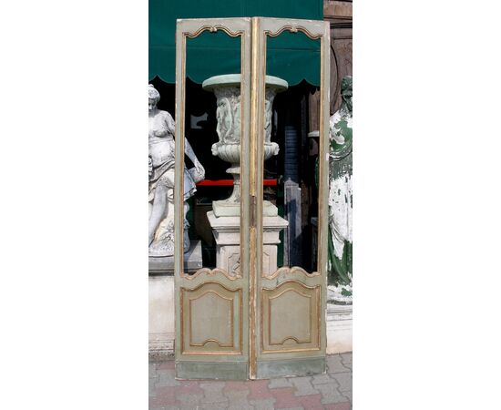 ptl520 - two-leaf lacquered glass door, 20th century, measuring 97 x 230 cm     