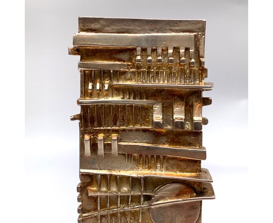 ARNALDO POMODORO, scultura "STELE", firmata in bronzo argentato, 1977