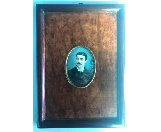 Miniature on ivory depicting a male figure. Signature and date 1887. Briar frame. France.     