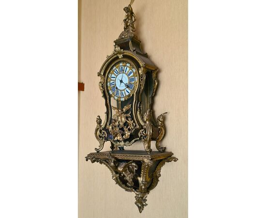 Orologio cartel.   Epoca e stile: Luigi XV, della seconda metà del XVIII secolo