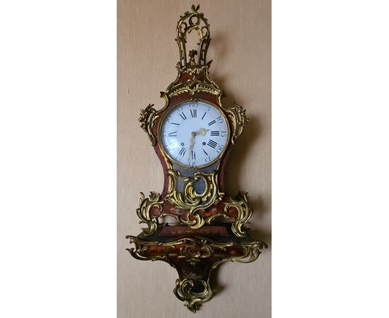 Orologio cartel.   Epoca e stile: Luigi XV, della seconda metà del XVIII secolo. 