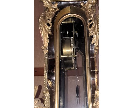Orologio cartel.   Epoca e stile: Luigi XV, della seconda metà del XVIII secolo