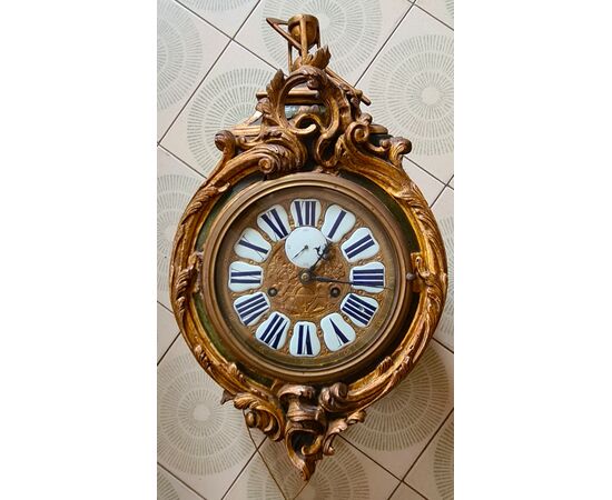 Cartel d’applique. Misure: cm. h. 57x32x20.