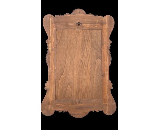 Specchiera in legno di noce con specchio molato.