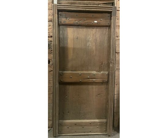 PTIR477 - Porta rustica in noce, con telaio, epoca '800, luce cm L 78 x H 184
