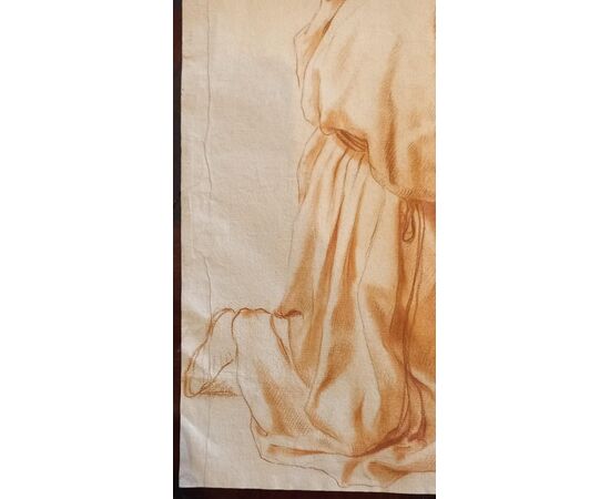 Disegno a sanguigna raffigurante Frate inginocchiato