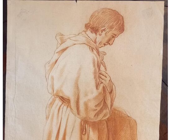 Disegno a sanguigna raffigurante Frate inginocchiato