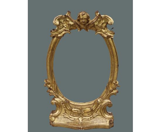 Importante cornice ligure-toscana tardo rinascimentale con angelo alato, fine XVI - inizi XVII secolo