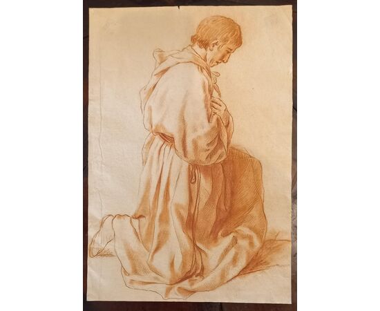 Disegno a sanguigna raffigurante Frate inginocchiato
