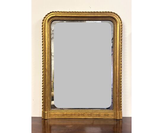 Specchiera in legno intagliato dorato con treccia sui lati XIX secolo .  118 x 87 