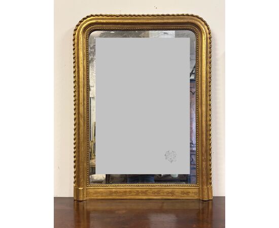 Specchiera in legno intagliato dorato con treccia sui lati XIX secolo .  118 x 87 