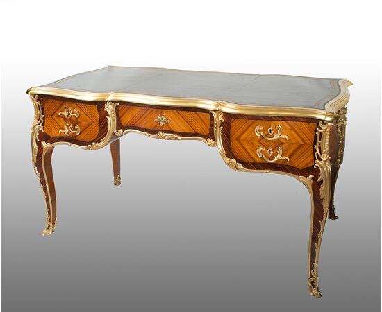 Scrivania /Bureau Plat antica Napoleone III Francese in legno esotico pregiato con innesti di elementi in bronzo dorato. Francia XIX secolo.
