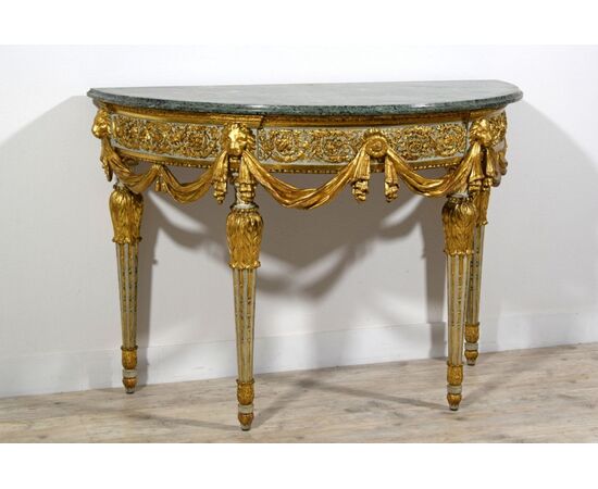 RISERVATA Importante e rara consolle a mezzaluna neoclassica in legno intagliato laccato e dorato, Torino, Francesco Bolgiè attr., fine XVIII secolo