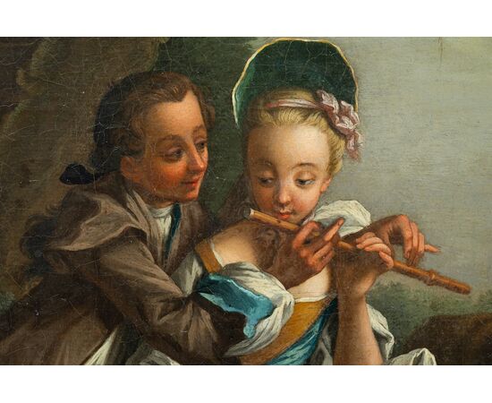 Coppia di dipinti antichi olio su tela con cornici coeve raffigurante scena pastorale con giovani musicisti. Francia fine XVIII secolo.