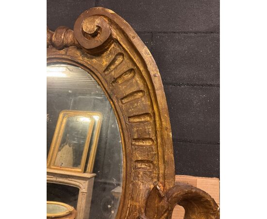 SPECC558 - Oval lacquered and gilded mirror, '7/'800 period, measures cm W 105 x H 207