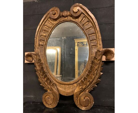 SPECC558 - Oval lacquered and gilded mirror, '7/'800 period, measures cm W 105 x H 207