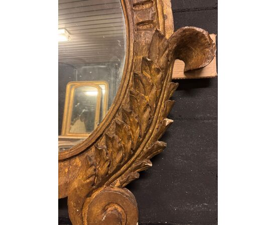 SPECC558 - Oval lacquered and gilded mirror, '7/'800 period, measures cm W 105 x H 207